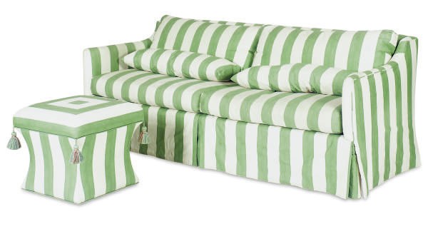 A GREEN AND WHITE UPHOLSTERED SOFA,