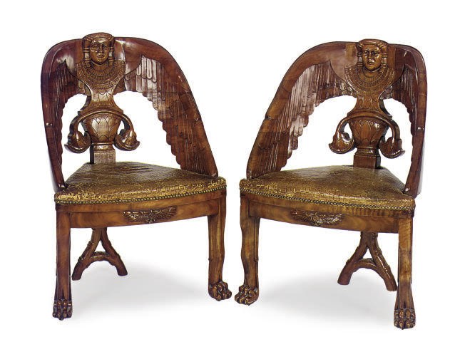 A SET OF THREE EGYPTIAN REVIVAL HARDWOOD AND LEATHER UPHOLSTERED CHAIRS,