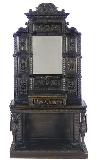 AN EBONIZED OAK HALL STAND,