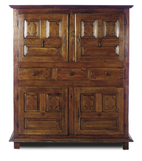 A CONTINENTAL WALNUT CUPBOARD,