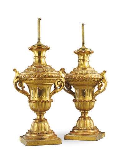 A PAIR OF ITALIAN GILTWOOD URNS MOUNTED AS LAMPS
