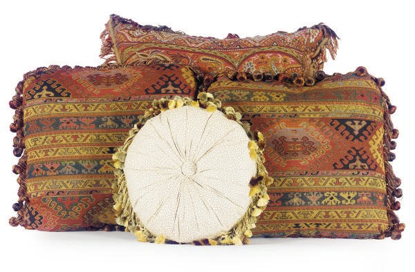 A GROUP OF SIXTEEN PILLOWS,