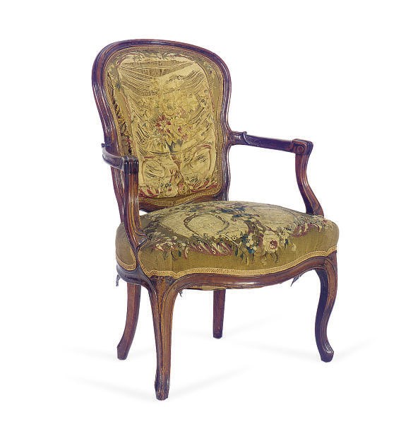 A FRENCH PROVINCIAL WALNUT AND TAPESTRY COVERED FAUTEUIL,