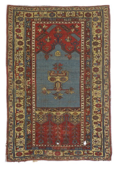 A LADIK PRAYER RUG,
