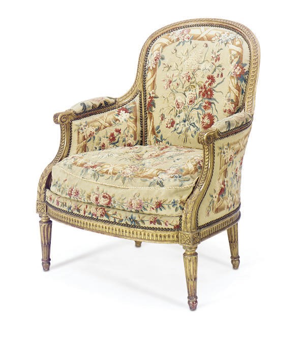 A FRENCH GILTWOOD AND TAPESTRY UPHOLSTERED BERGERE,