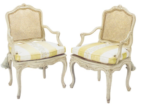 A PAIR OF REGENCE PAINTED AND CANED FAUTEUILS,