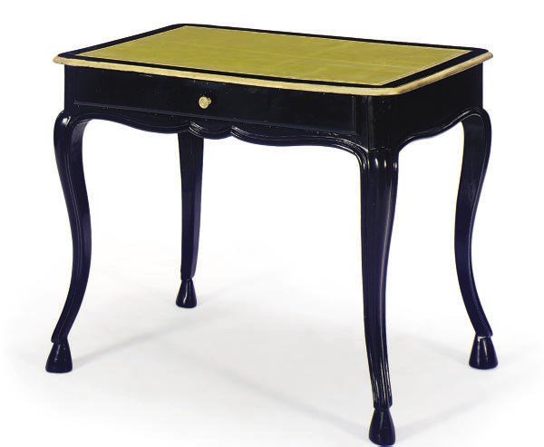 A CONTINENTAL EBONIZED AND PARCEL-GILT WRITING TABLE,