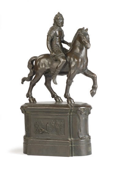 A PATINATED BRONZE FIGURE OF A SOLDIER ON HORSEBACK,