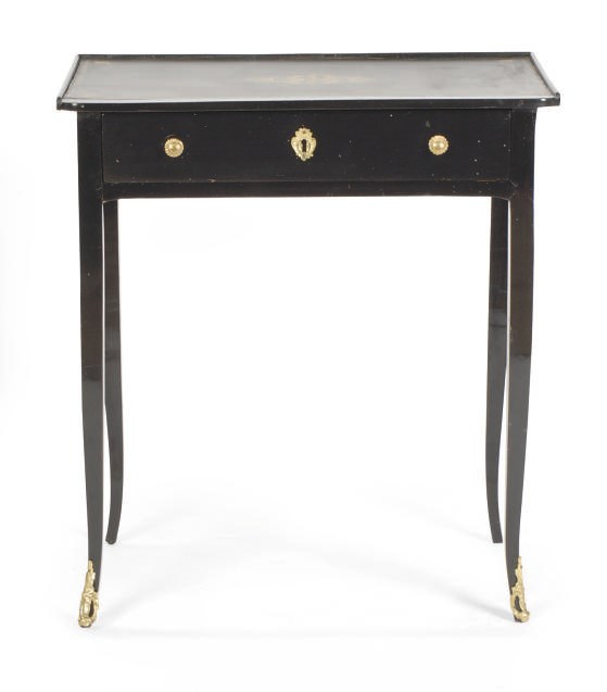 A CONTINENTAL EBONIZED WRITING TABLE,