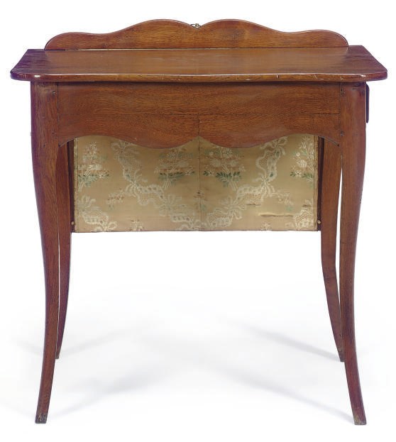 A FRENCH PROVINCIAL OAK WRITING TABLE,