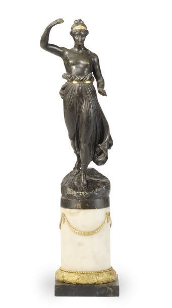 A PATINATED AND GILT-BRONZE FIGURE,