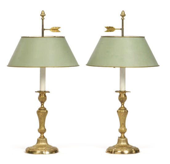 A PAIR OF GILT-BRONZE CANDLESTICKS MOUNTED AS LAMPS,