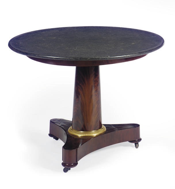 AN EMPIRE ORMOLU-MOUNTED MAHOGANY CENTER TABLE,