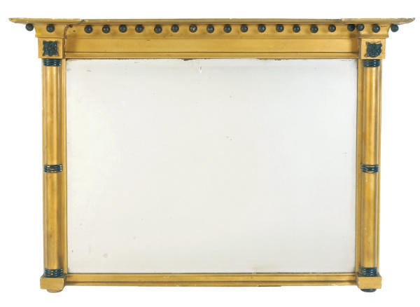 A GILTWOOD AND EBONIZED OVERMANTLE MIRROR,