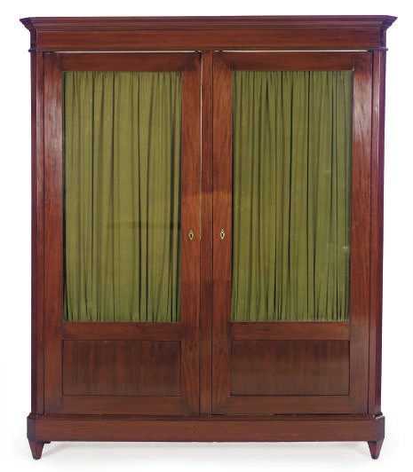 A CONTINENTAL MAHOGANY BIBLIOTEQUE,