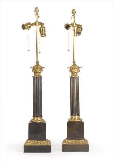 A PAIR OF PATINATED AND GILT-METAL COLUMNAR TABLE LAMPS,