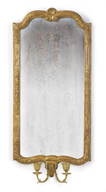 A CONTINENTAL GILTWOOD AND GILT-METAL TWO-LIGHT GIRANDOLE MIRROR,