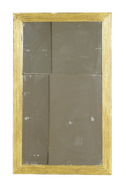 A CONTINENTAL GILTWOOD MIRROR,