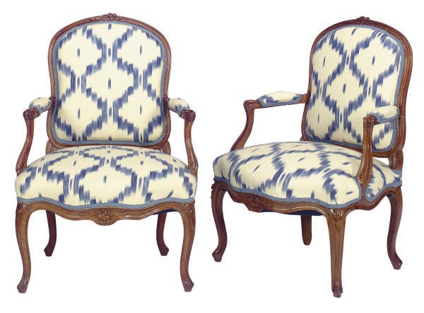 A PAIR OF LOUIS XV WALNUT AND UPHOLSTERED FAUTEUILS,