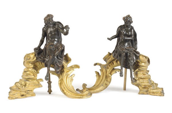 A PAIR OF FRENCH PATINATED AND GILT-BRONZE FIGURAL CHENETS,