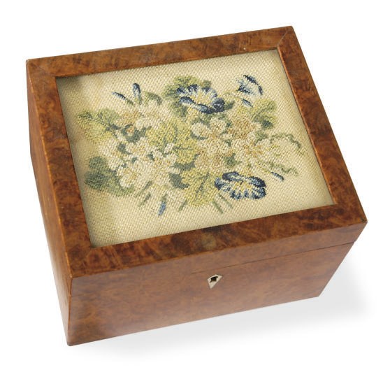 A YEWWOOD AND NEEDLEWORK TEA CADDY**,