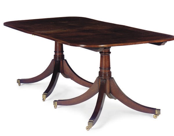 A MAHOGANY AND CROSSBANDED TWIN-PEDESTAL DINING TABLE,