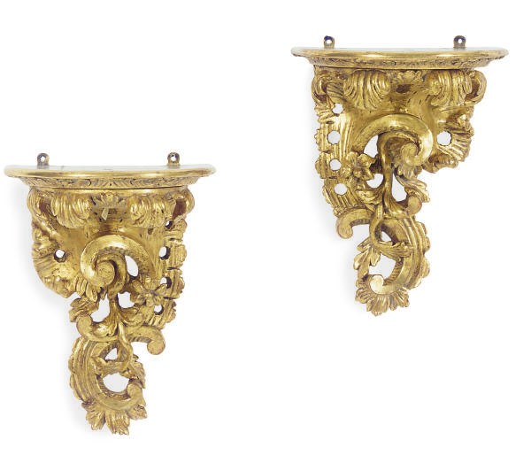 A PAIR OF CARVED GILTWOOD WALL BRACKETS,