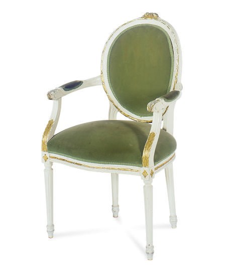A WHITE-PAINTED AND PARCEL-GILT FAUTEUIL,