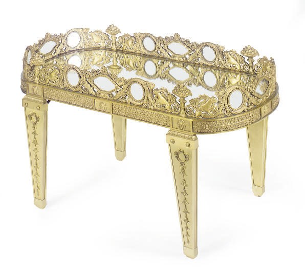 A CONTINENTAL GILT-BRONZE AND MIRRORED GLASS LOW TABLE,