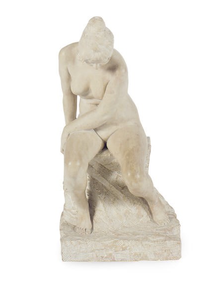 A BURGUNDY LIMESTONE FIGURE OF A SEATED WOMAN,