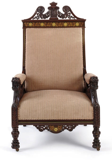 AN AESTHETIC MOVEMENT CARVED AND MARQUETRY AND BRASS INLAID WALNUT ARMCHAIR,