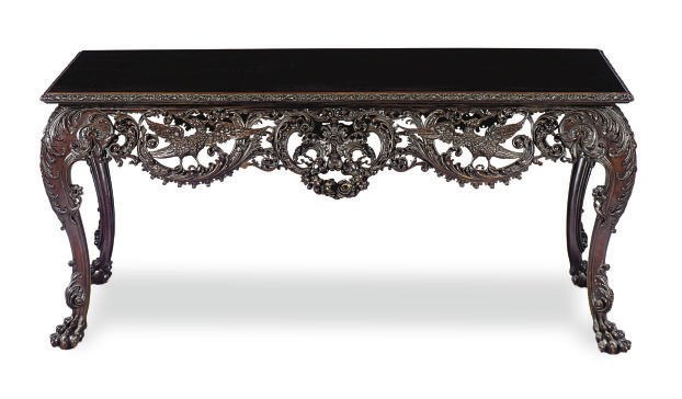 AN IRISH MAHOGANY CENTER TABLE,