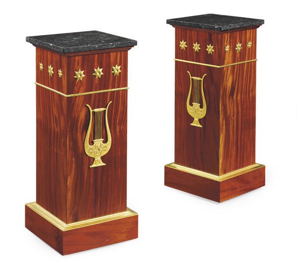 A PAIR OF FRENCH ORMOLU-MOUNTED MAHOGANY PEDESTALS