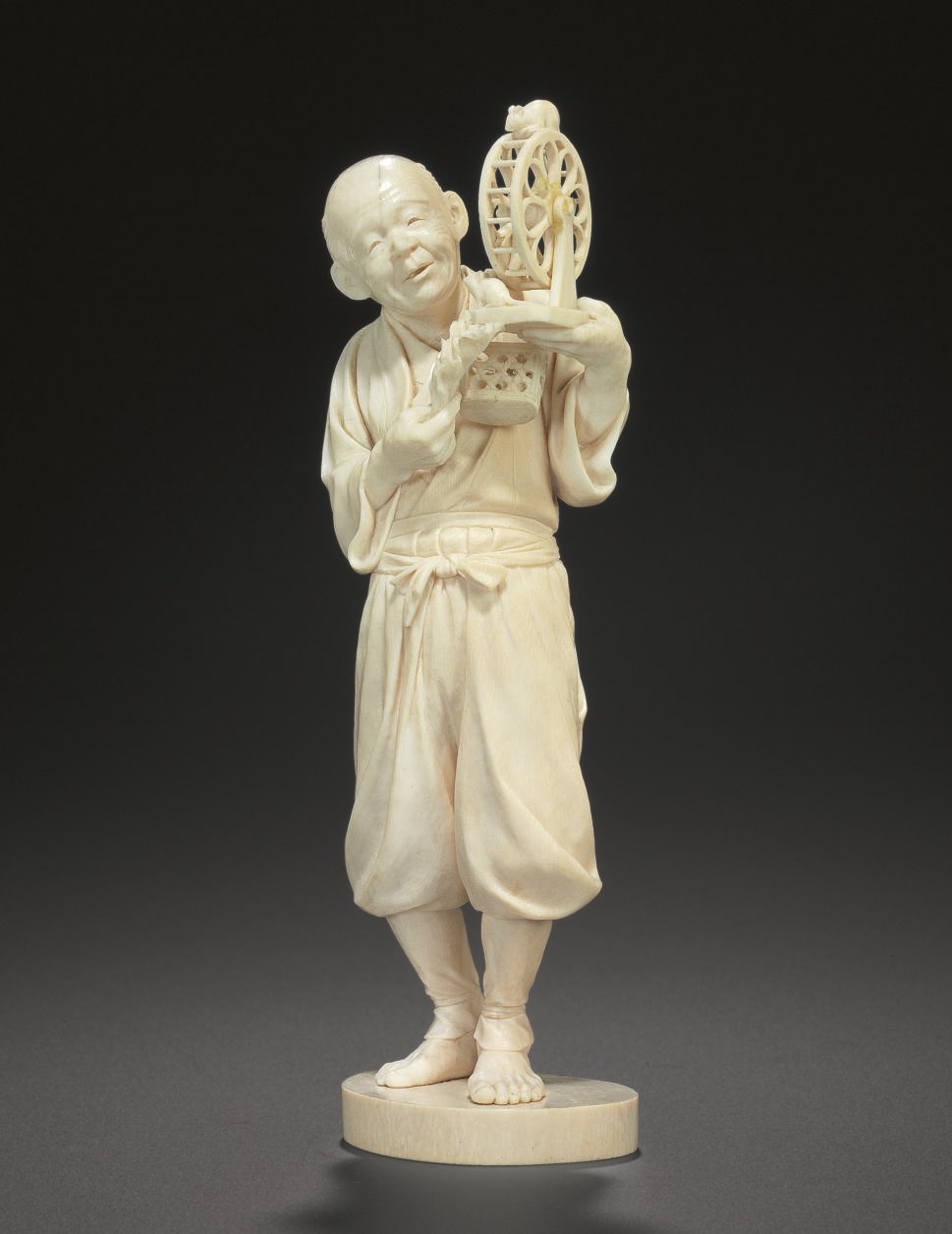 An Ivory Model of a Man with Trained Mice**