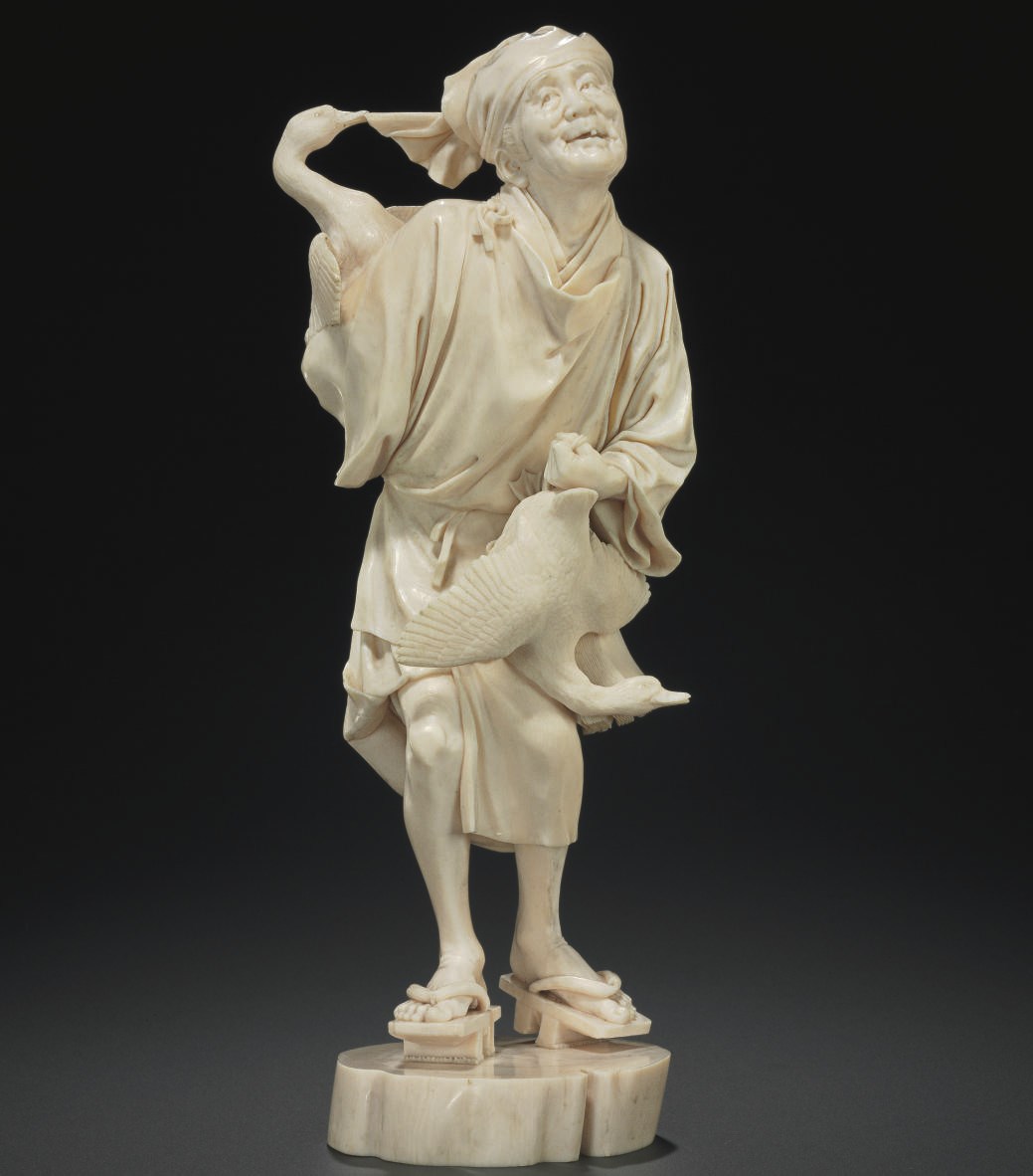 An Ivory Model of a Man with Two Geese**