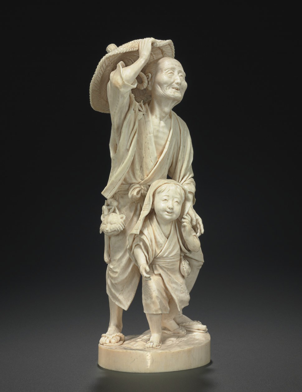 An Ivory Model of an Old Man and a Boy**