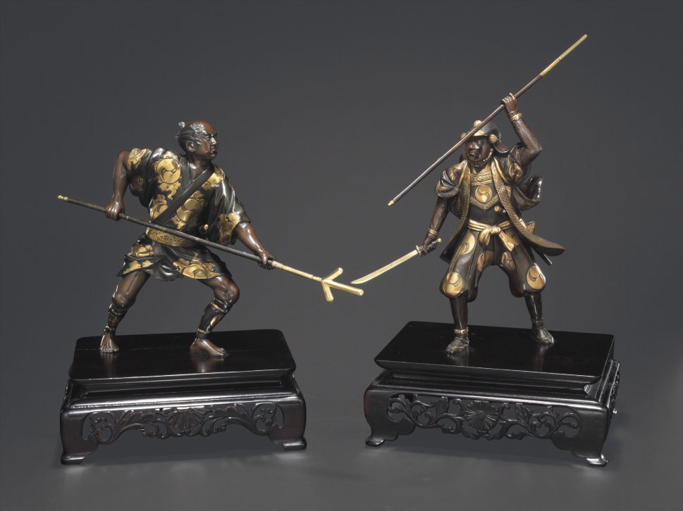 A Pair of Parcel-Gilt Bronze Models of Warriors