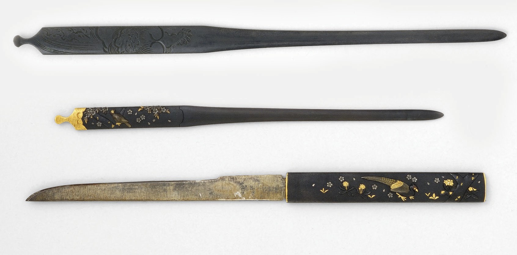 A Shakudo Kozuka and Kogai and another Shakudo Kogai