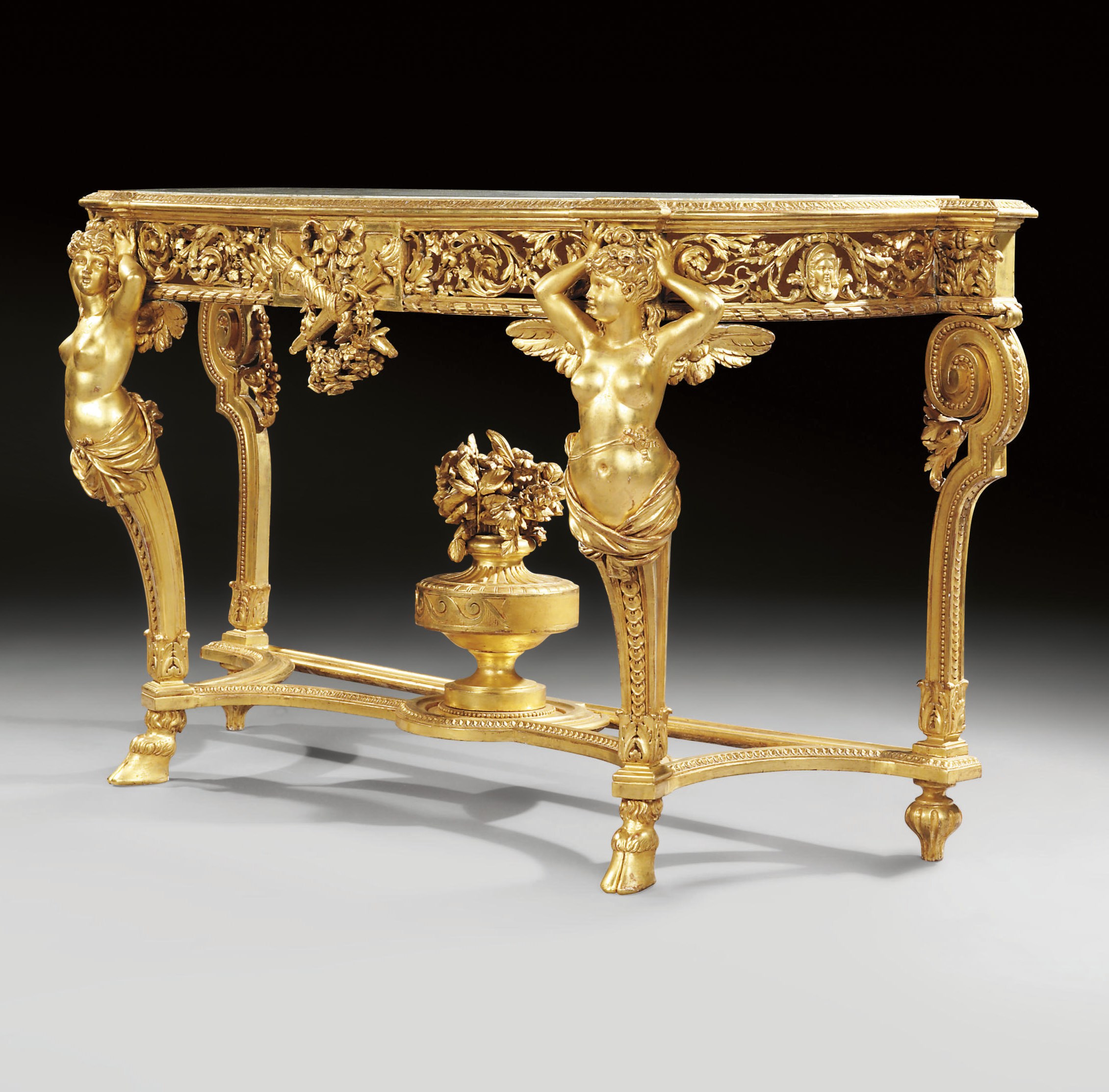 A FRENCH GILTWOOD CONSOLE-TABLE