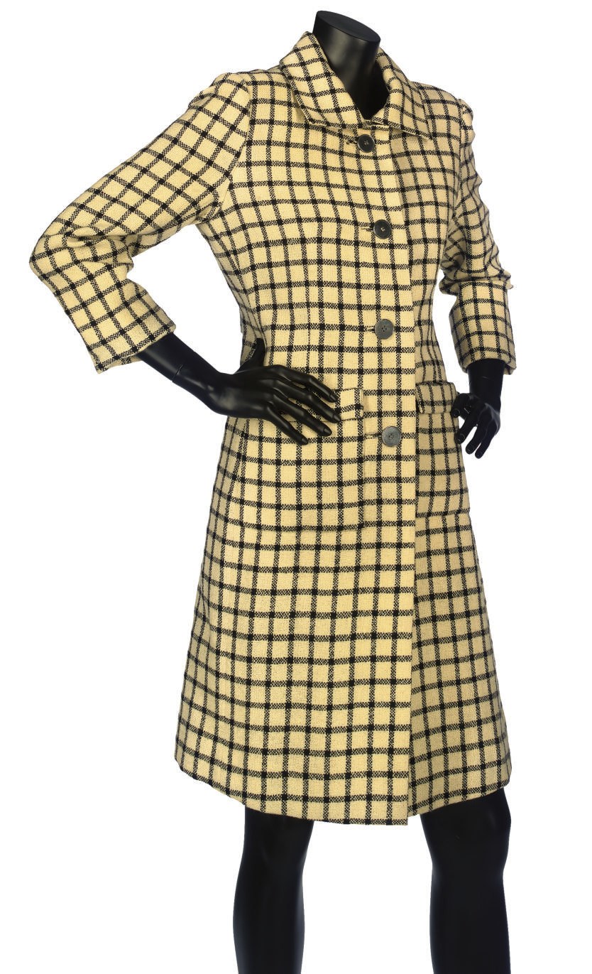 GIVENCHY COUTURE
A CREAM AND BLACK CHECK COAT