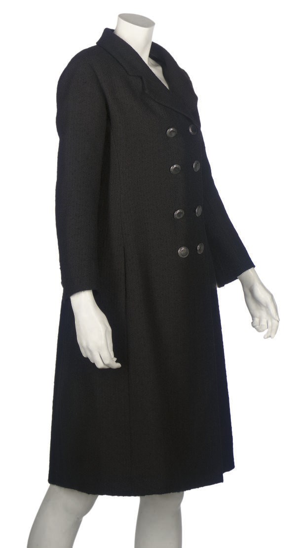YVES SAINT LAURENT COUTURE
A DOUBLE BREASTED BLACK WOOL COAT