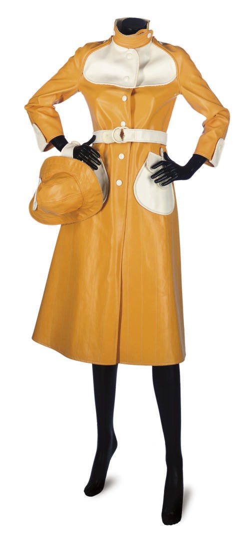 COURRÈGES
A HONEY-YELLOW RAINCOAT AND HAT