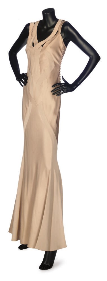 CHRISTIAN DIOR BOUTIQUE
A DRAMATIC NUDE EVENING GOWN