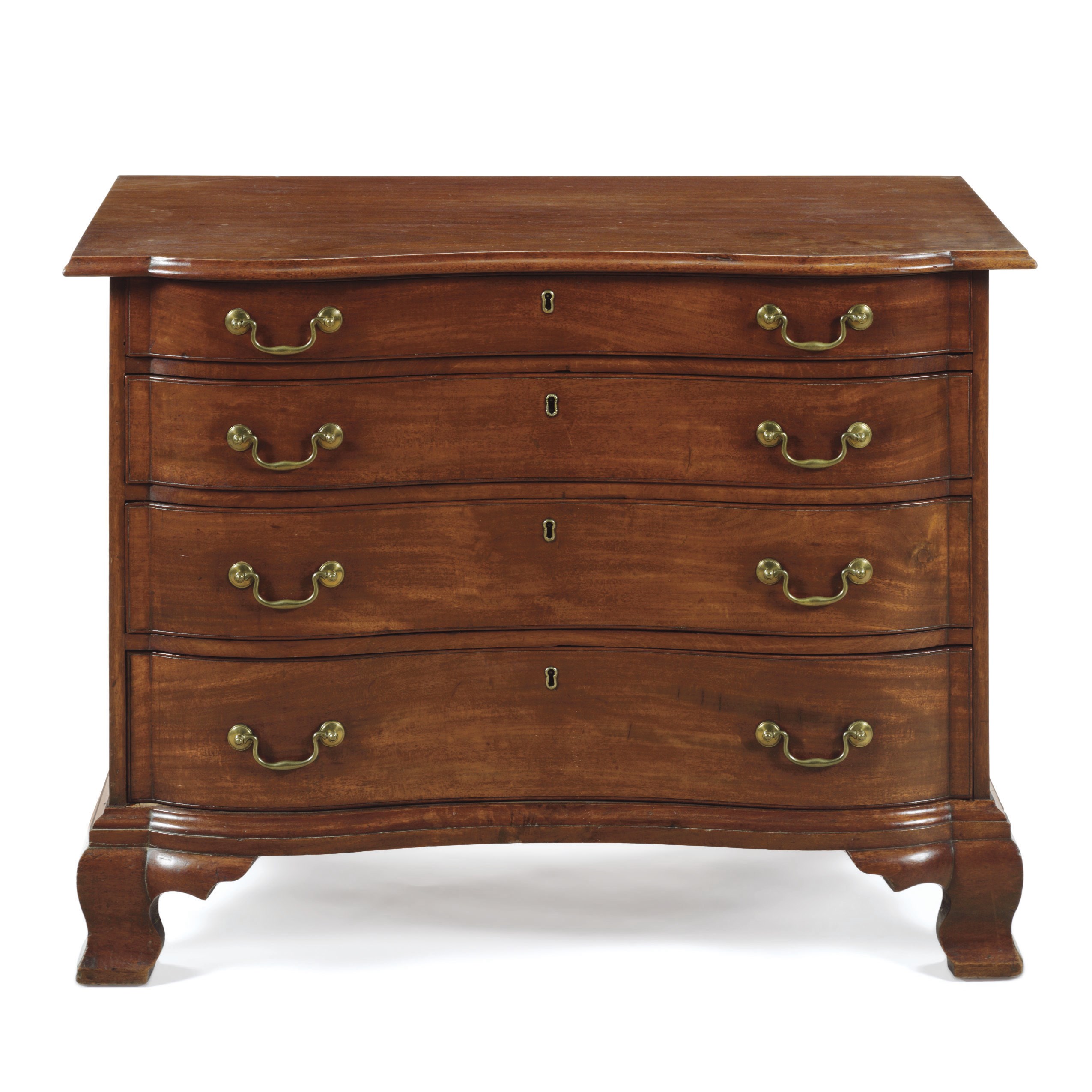 A CHIPPENDALE MAHOGANY REVERSE-SERPENTINE CHEST-OF-DRAWERS