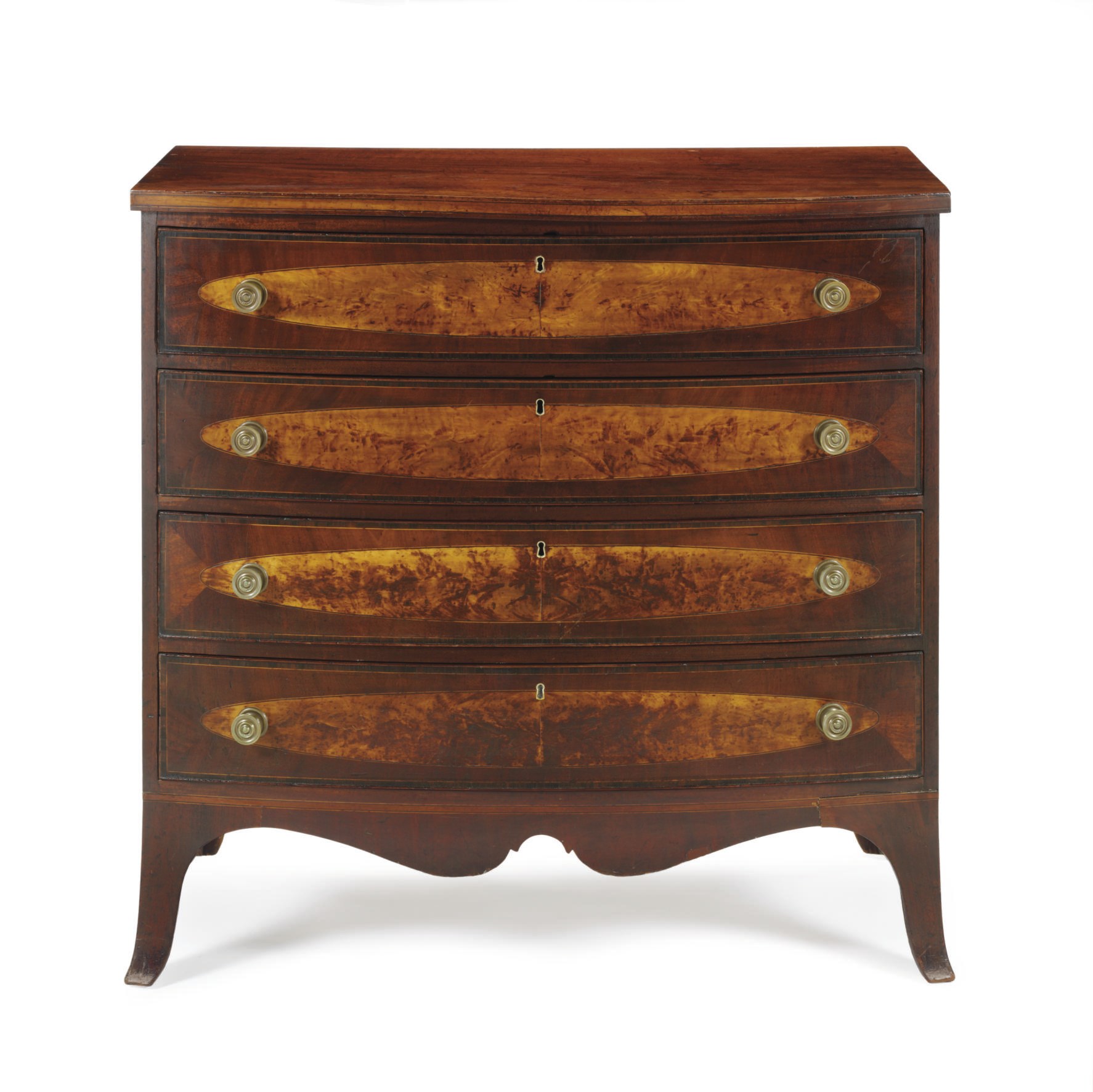 A FEDERAL BIRCHWOOD AND MAHOGANY VENEERED BOW-FRONT CHEST-OF-DRAWERS