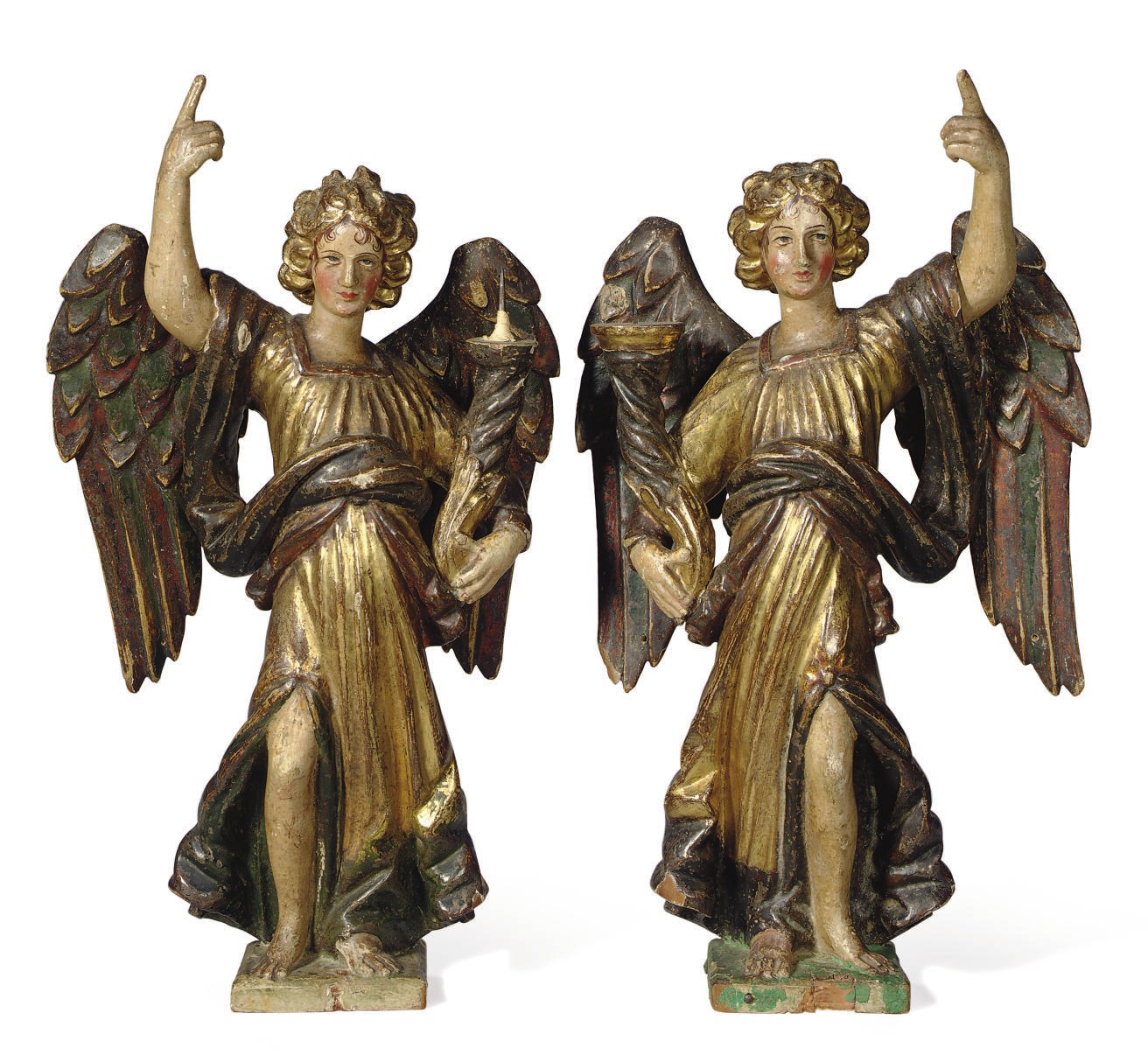 A PAIR OF ITALIAN GILTWOOD AND POLYCHROME-DECORATED FIGURAL CANDLESTICKS