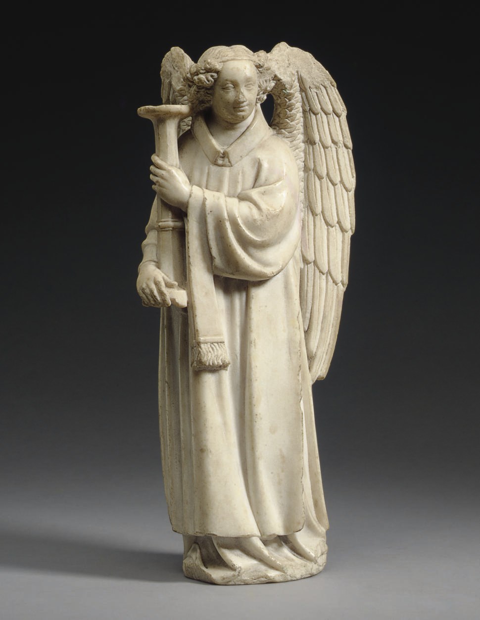 A MARBLE FIGURE OF AN ANGEL