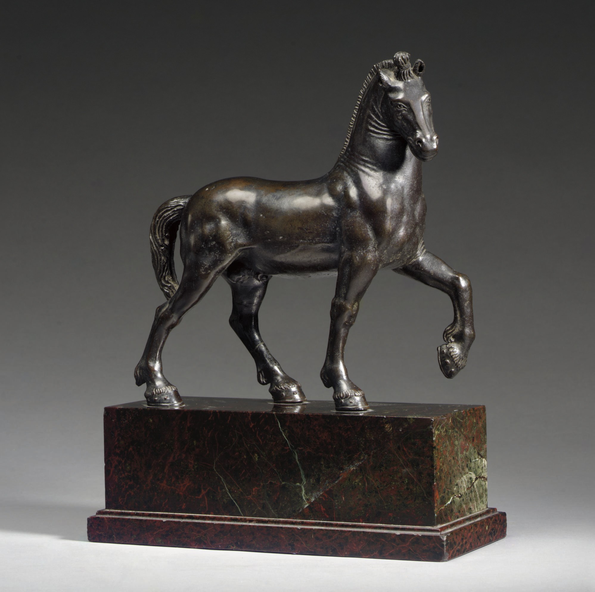 A BRONZE FIGURE OF A SAINT MARK'S HORSE