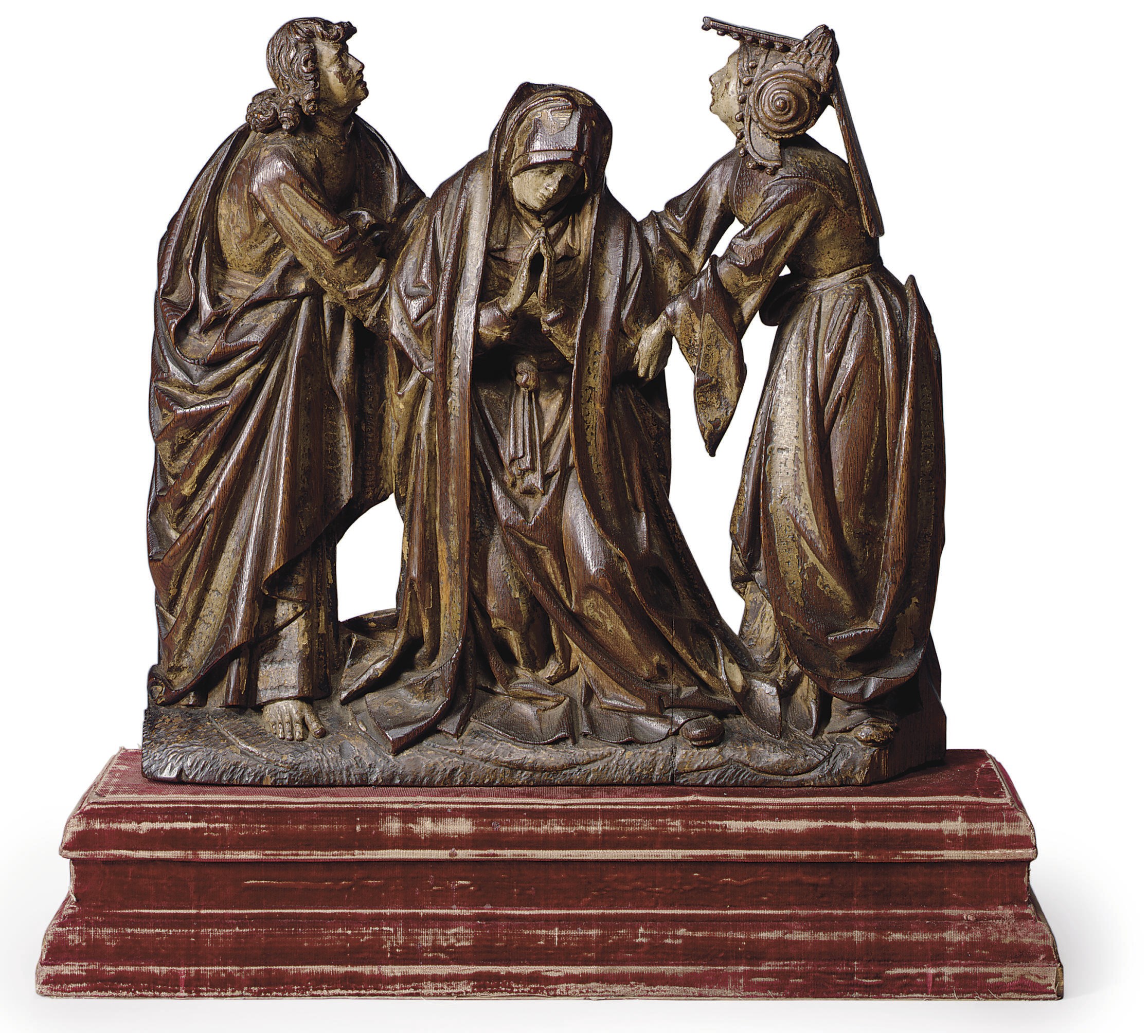 A GILTWOOD AND POLYCHROME-DECORATED CARVED RELIEF OF THE SWOONING OF THE VIRGIN