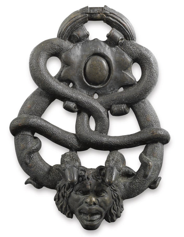 AN ITALIAN PATINATED BRONZE DOOR KNOCKER